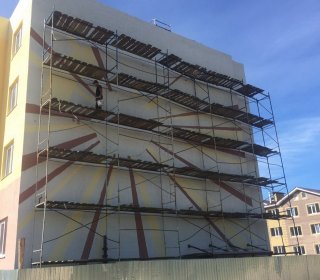 Отделка фасада многоквартирного жилого дома пос.Рыбацкий, ул.Зеленая д.12