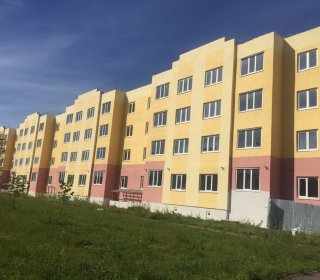 Отделка фасада многоквартирного жилого дома пос.Рыбацкий, ул.Зеленая д.12